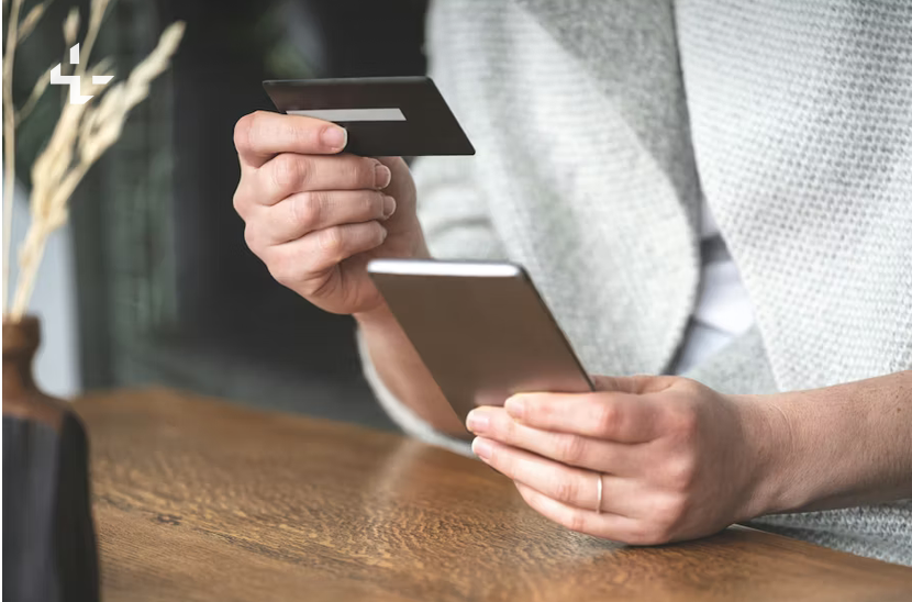 Person making a contactless payment with their phone
